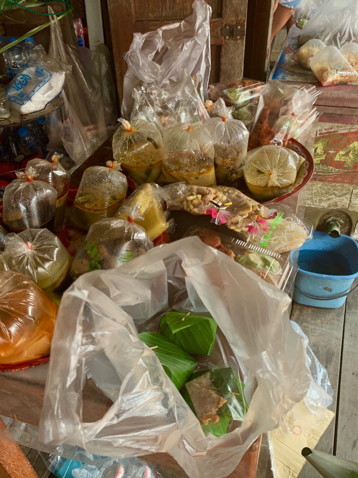 corner store riverside chao phraya river bangkok skelly