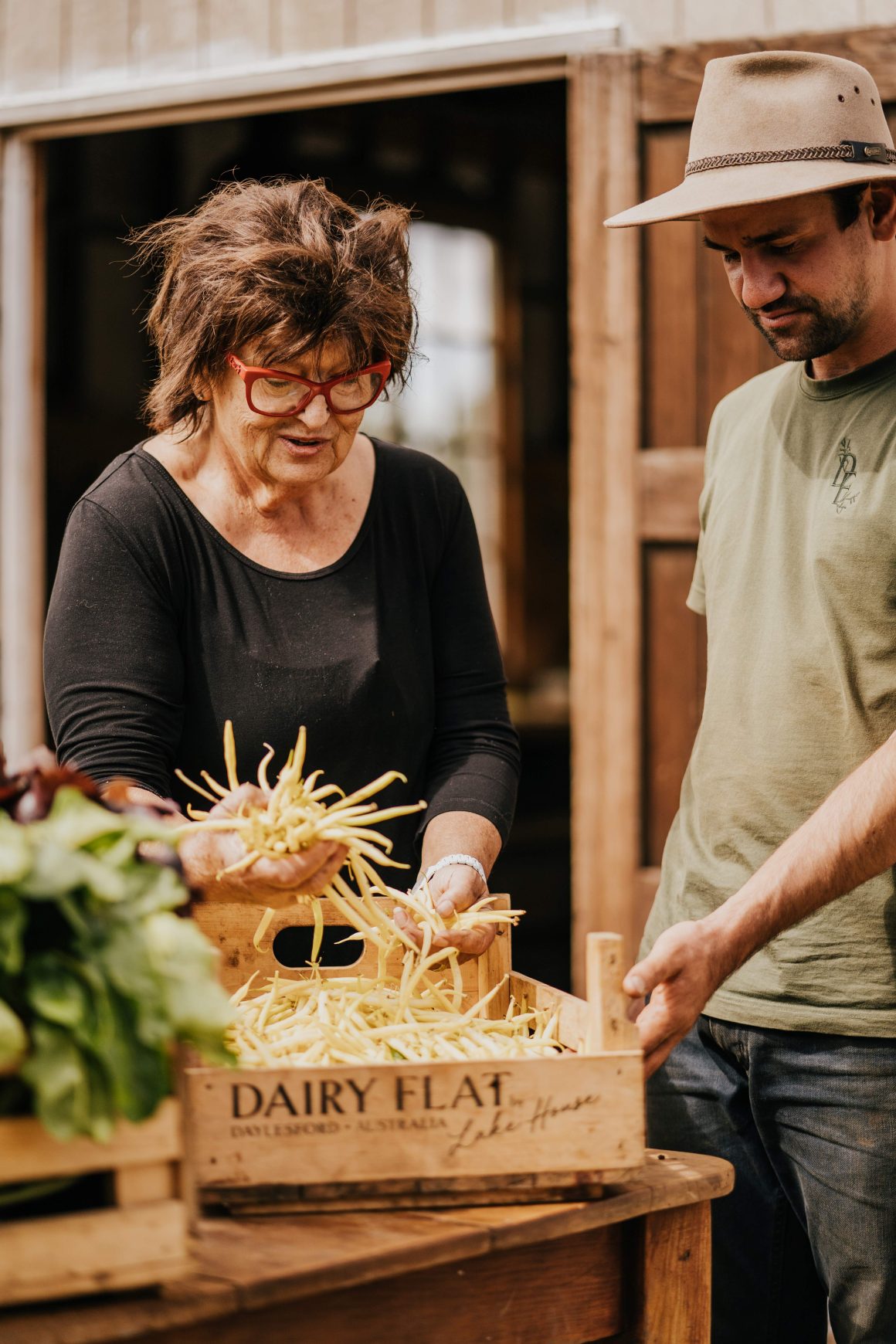 Alla Wolf-Tasker checks the day's harvest at Dairy Flat Farm